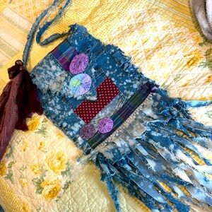 Amazing handmade blue jean purse with fringe.